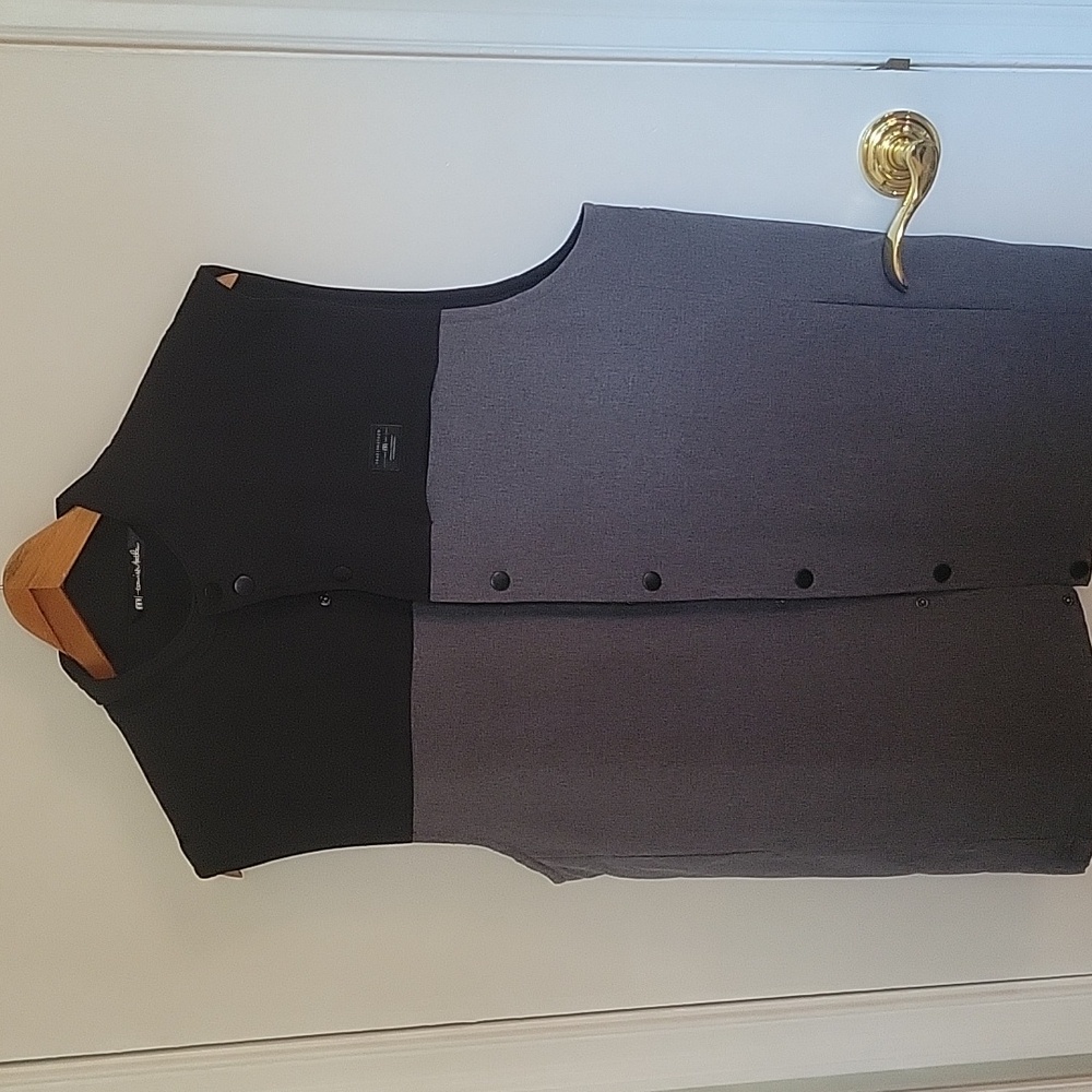 Travis Mathew snap vest. Black and Gray. L